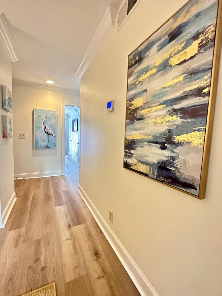 Hallway with coastal art