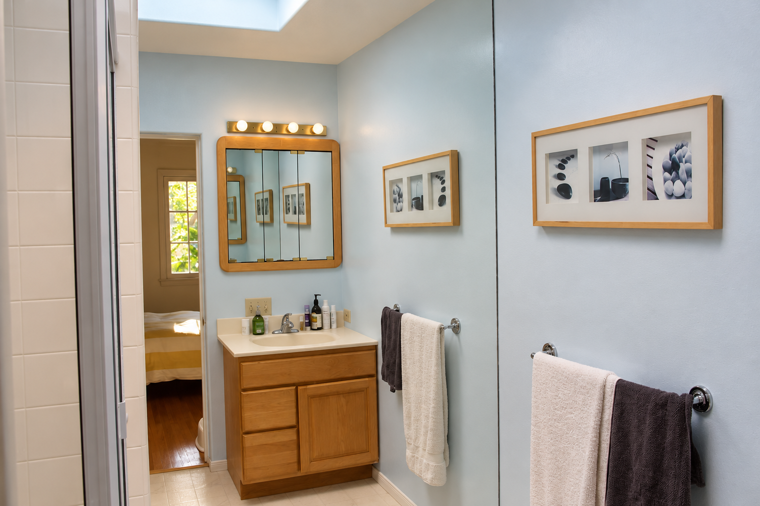 Bathroom with vanity and shower.