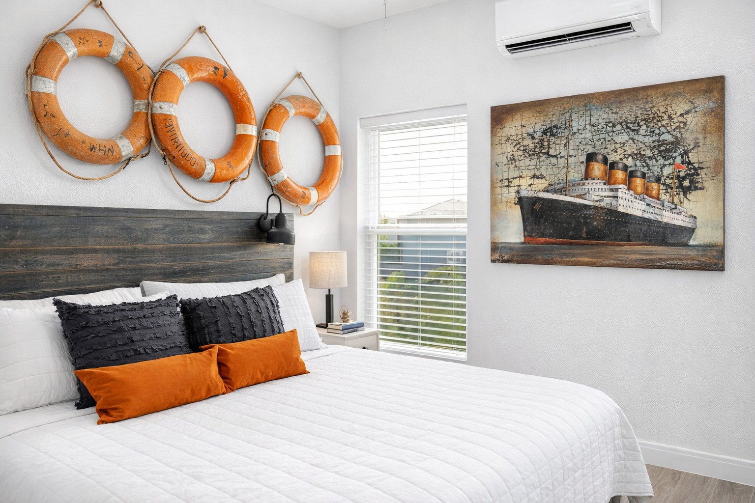 Titanic Primary Suite (Main Floor): King bed with coastal charm — this suite includes a private ensuite bathroom.