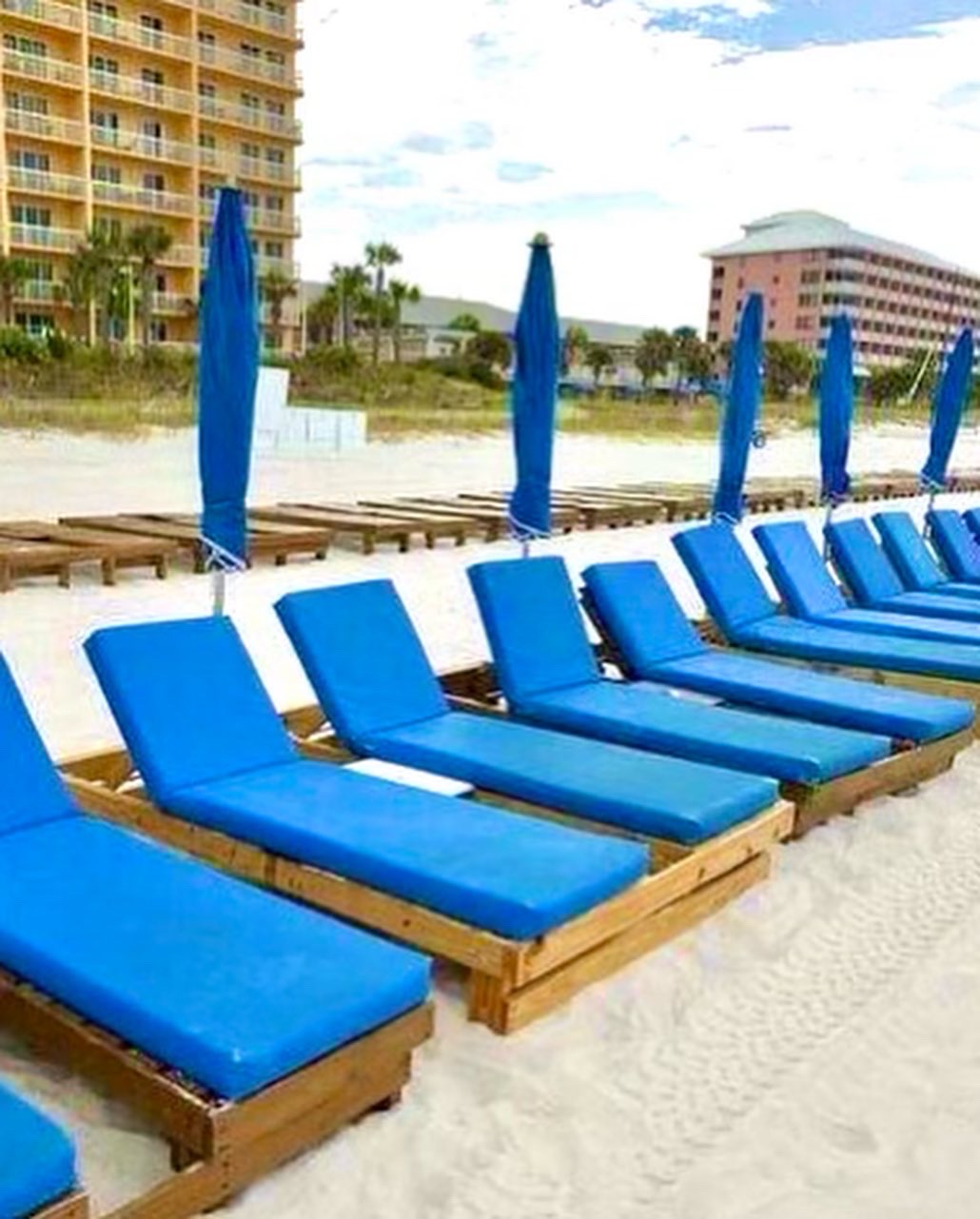 Chairs available to rent on the beach in front of 