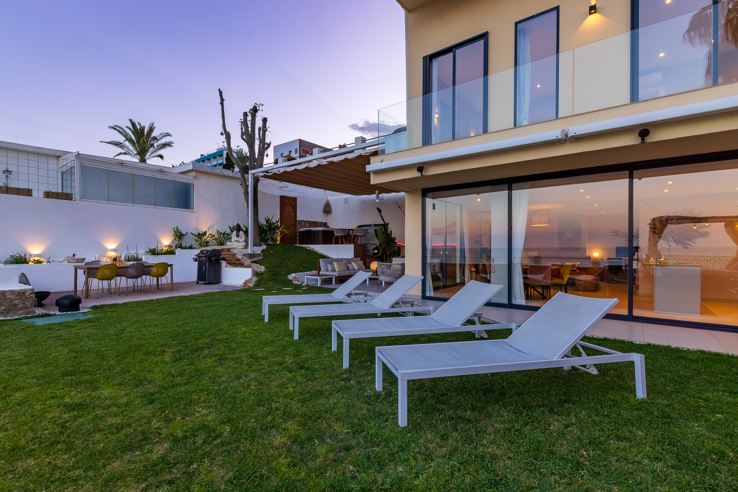 Evening view of the duplex, private garden and outdoor spaces