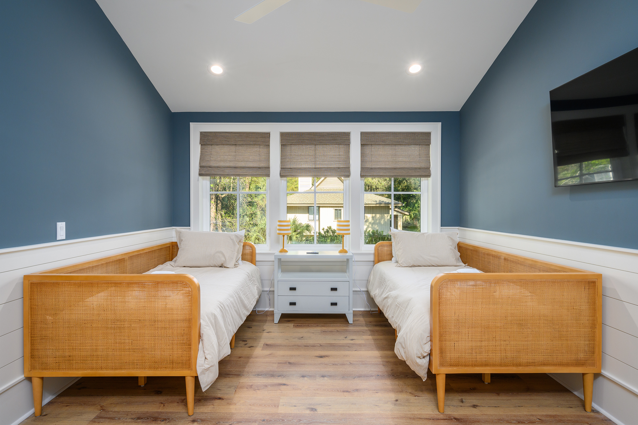 Twin beds in private suite over the garage