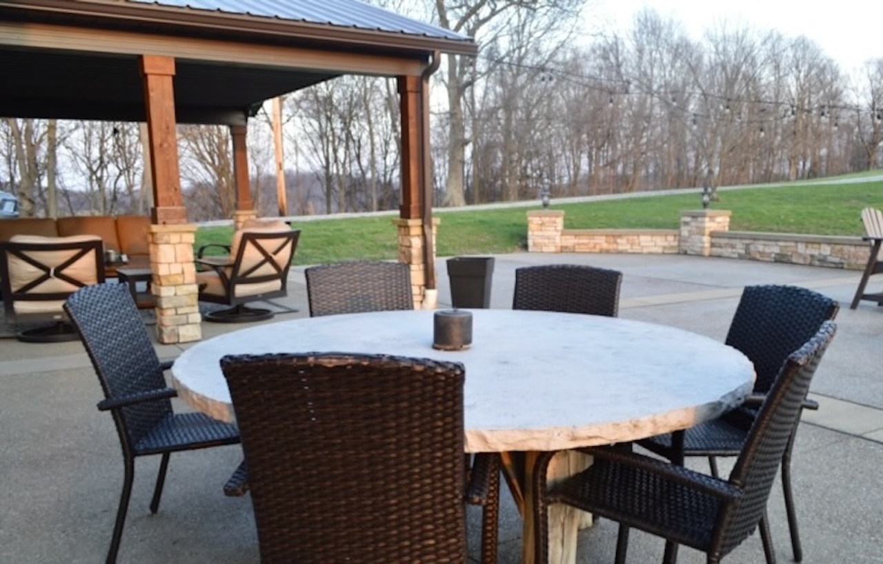 Outdoor dining with views of the patio and fire pit just steps away