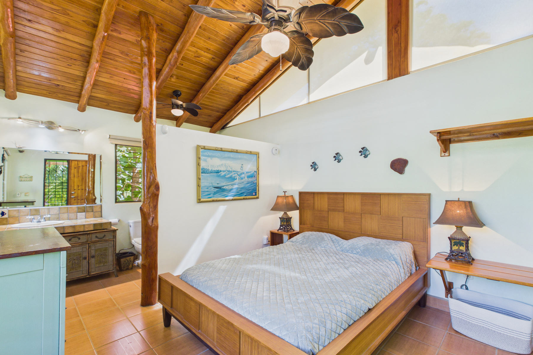 Bedroom 5.  Full size bed.  Private entrance from rest of house only accessed by outdoor covered spiral staircase.  En suite bathroom with tub/shower.  AC