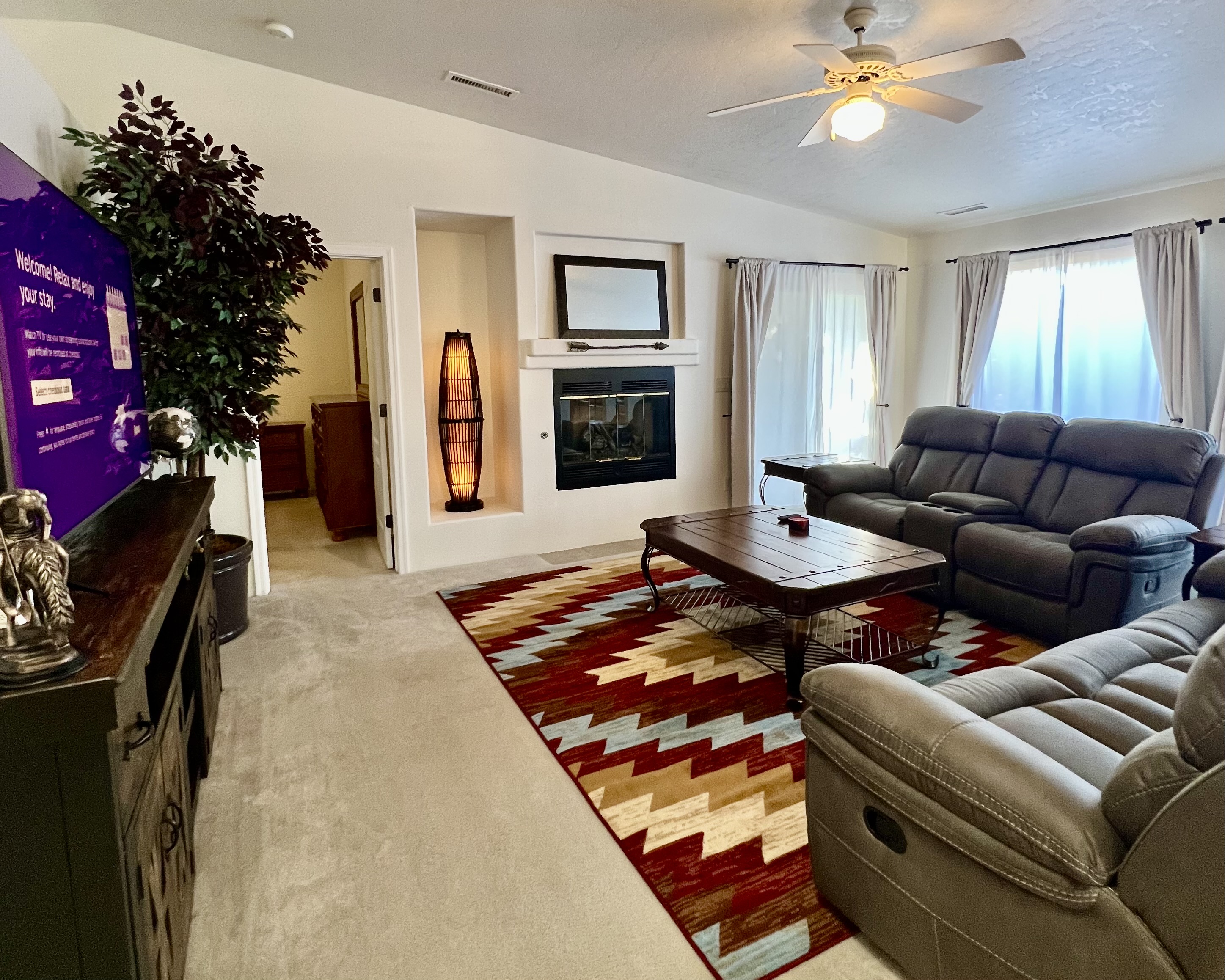 Experience true relaxation in the inviting living room, bathed in natural light
