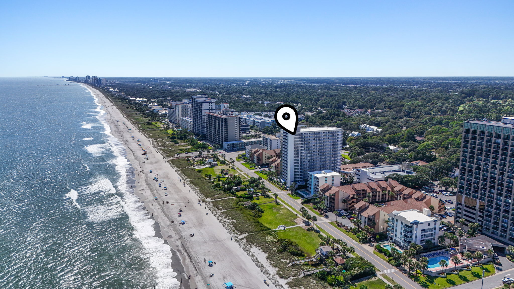 Aerial view of the coastline with Forest Dunes marked
