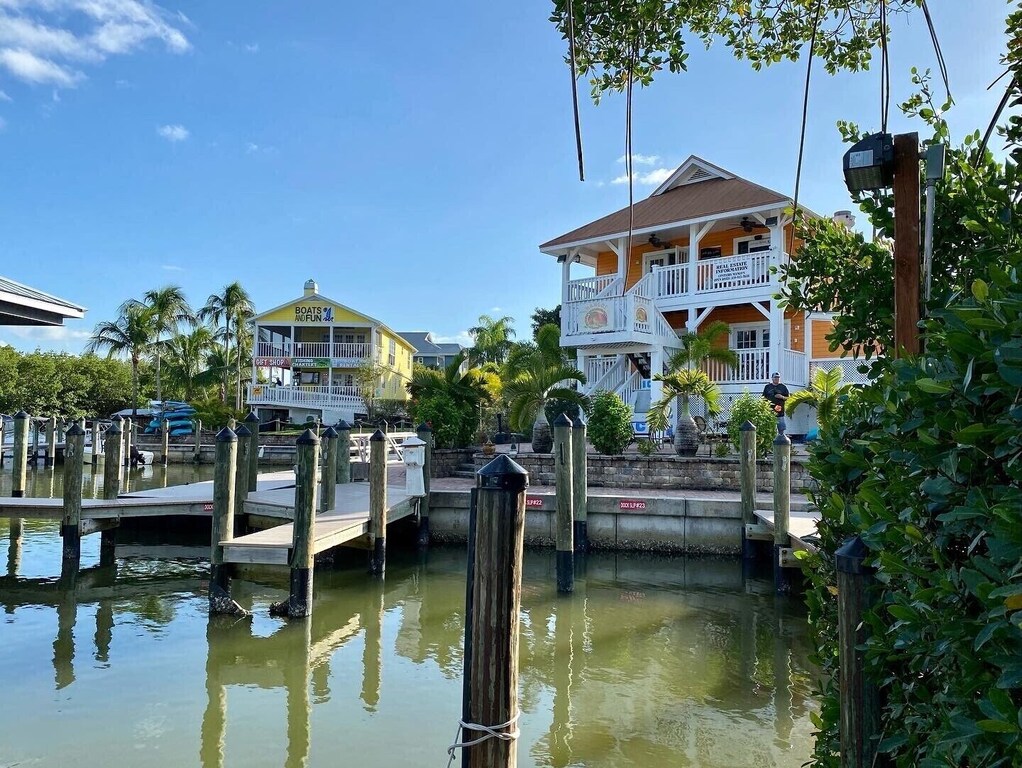Hop on a golf cart and zoom off to picturesque NCI harbor with Boats & Fun and Mangoes Café/Bar, and public pool.