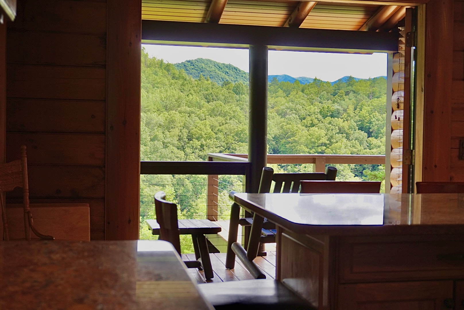 Breathtaking mountain views from your rustic dining space—perfect for unforgettable meals!