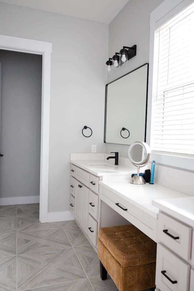 Master bathroom has private water closet, makeup vanity, two sinks, a bathtub, and a large walk-in shower with two shower heads. Amazing water pressure!