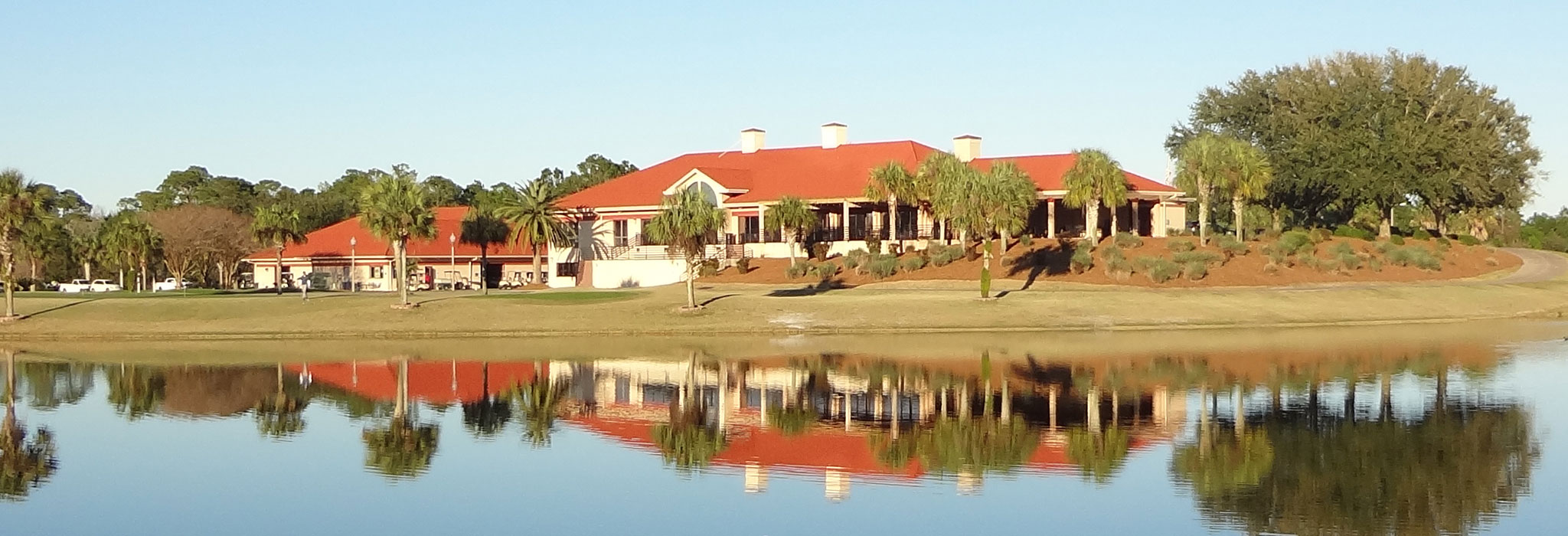 Scenic lakeside clubhouse views at the nearby golf club, perfect for a round or a relaxing dinner out.