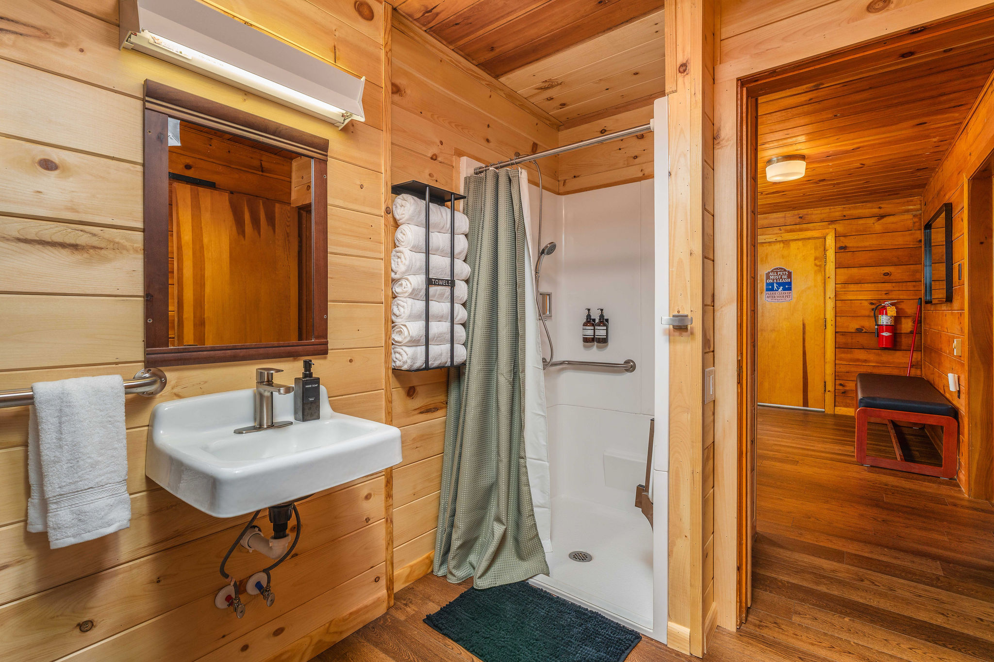 🚿 Roll-in shower with safety bar — ADA-compatible bathing for guests of every ability.