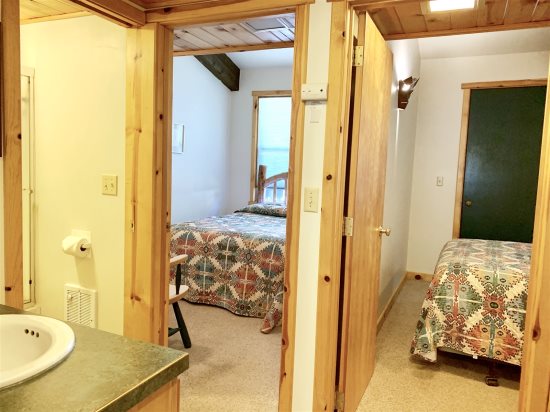Bedrooms just outside bathroom area