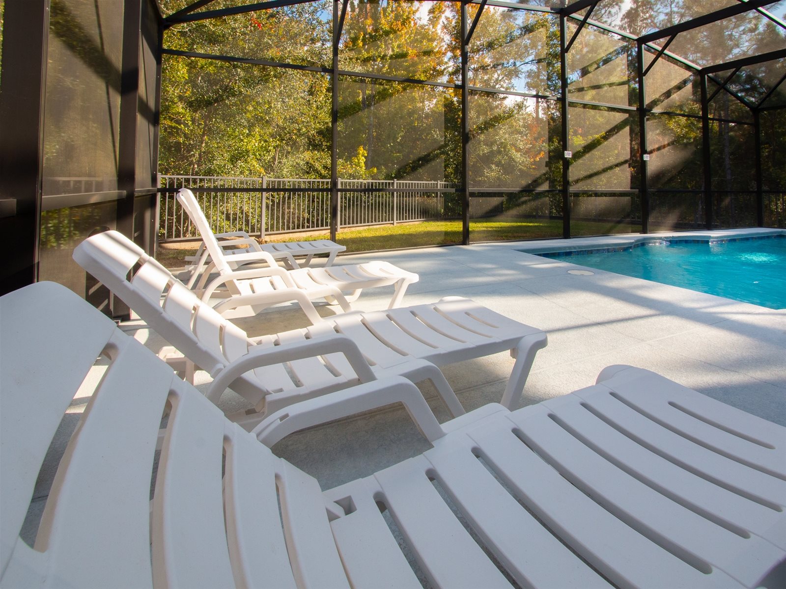 Loungers by the Private Screened Pool.