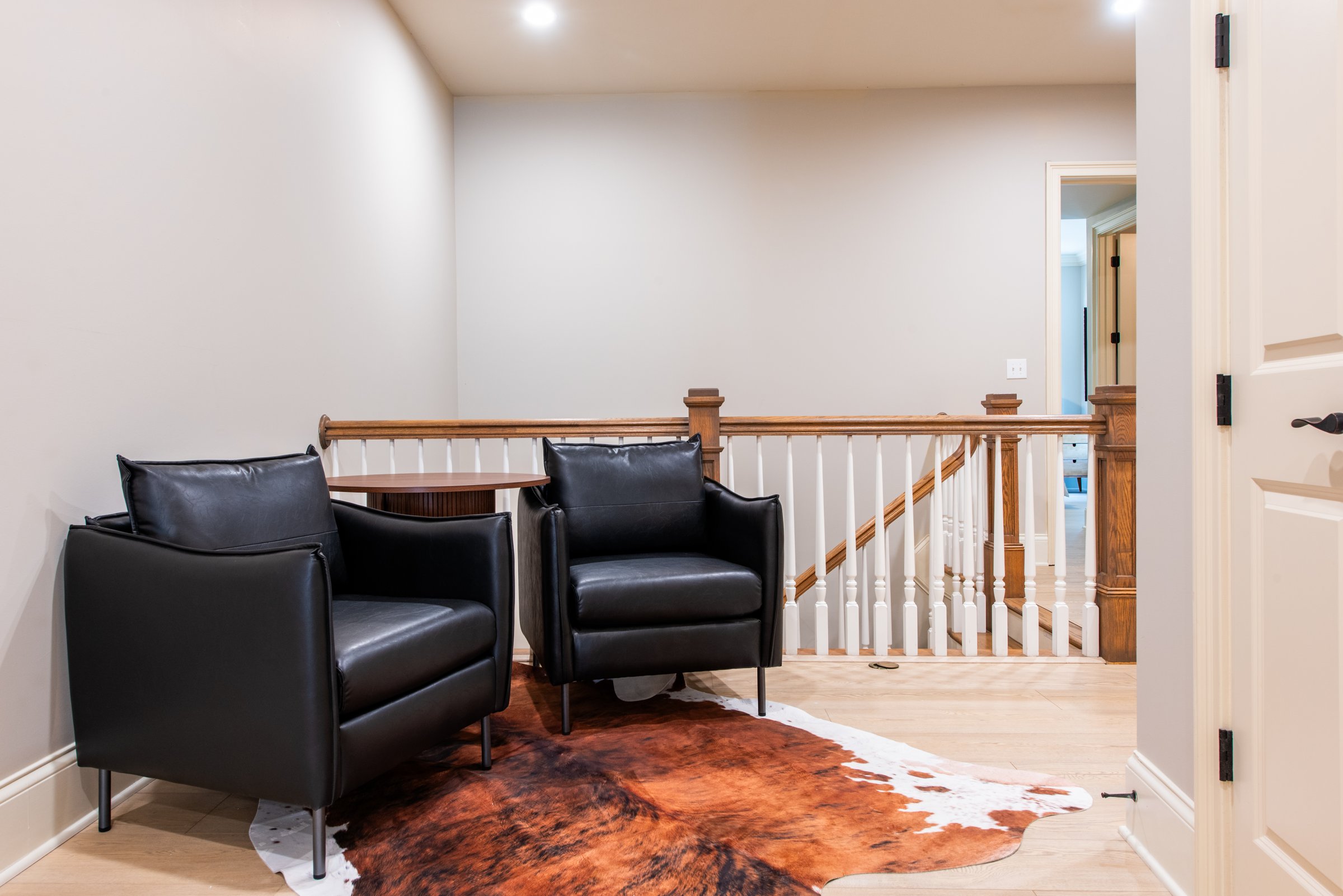 A quiet sitting nook at the top of the stairs.