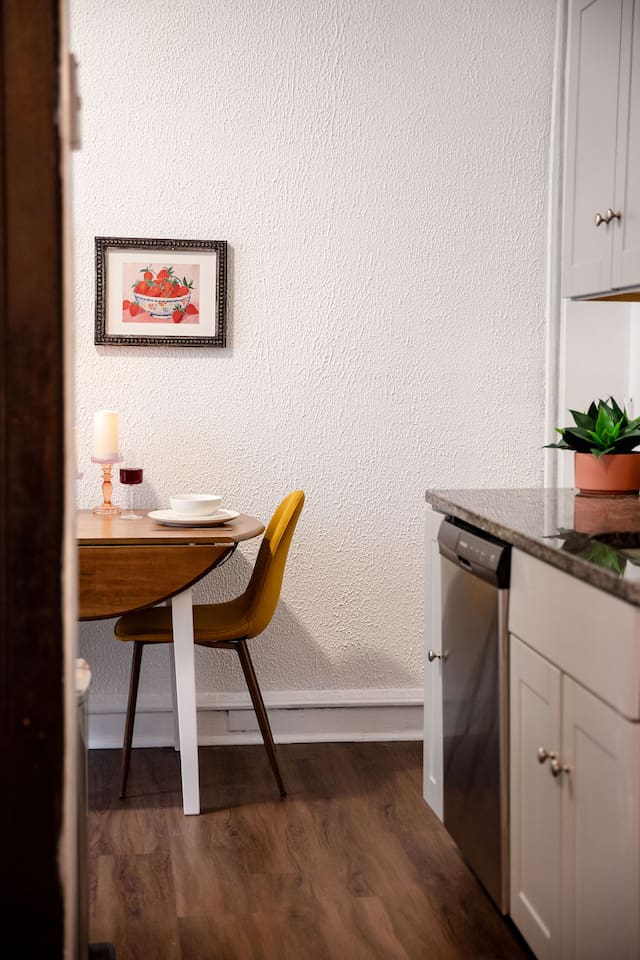 Cozy dining area for two, perfect for intimate meals or casual gatherings.