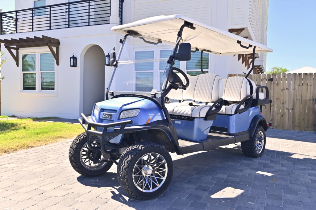 Complimentary six-seater, street-legal golf cart.
