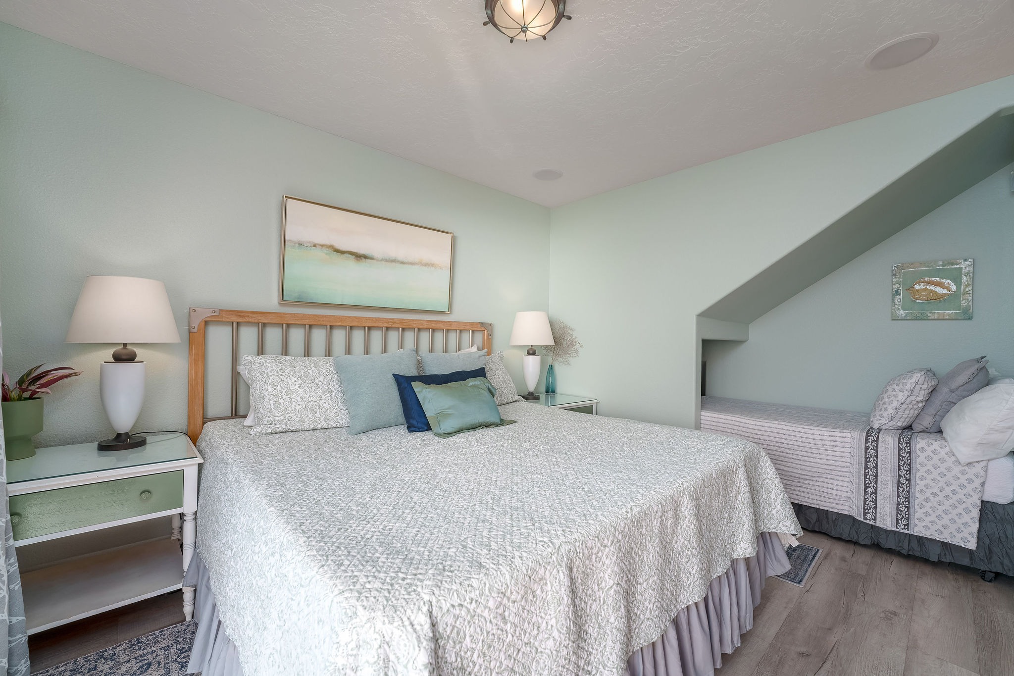 Make yourself at home in our warm and welcoming king with twin bedroom oasis.
