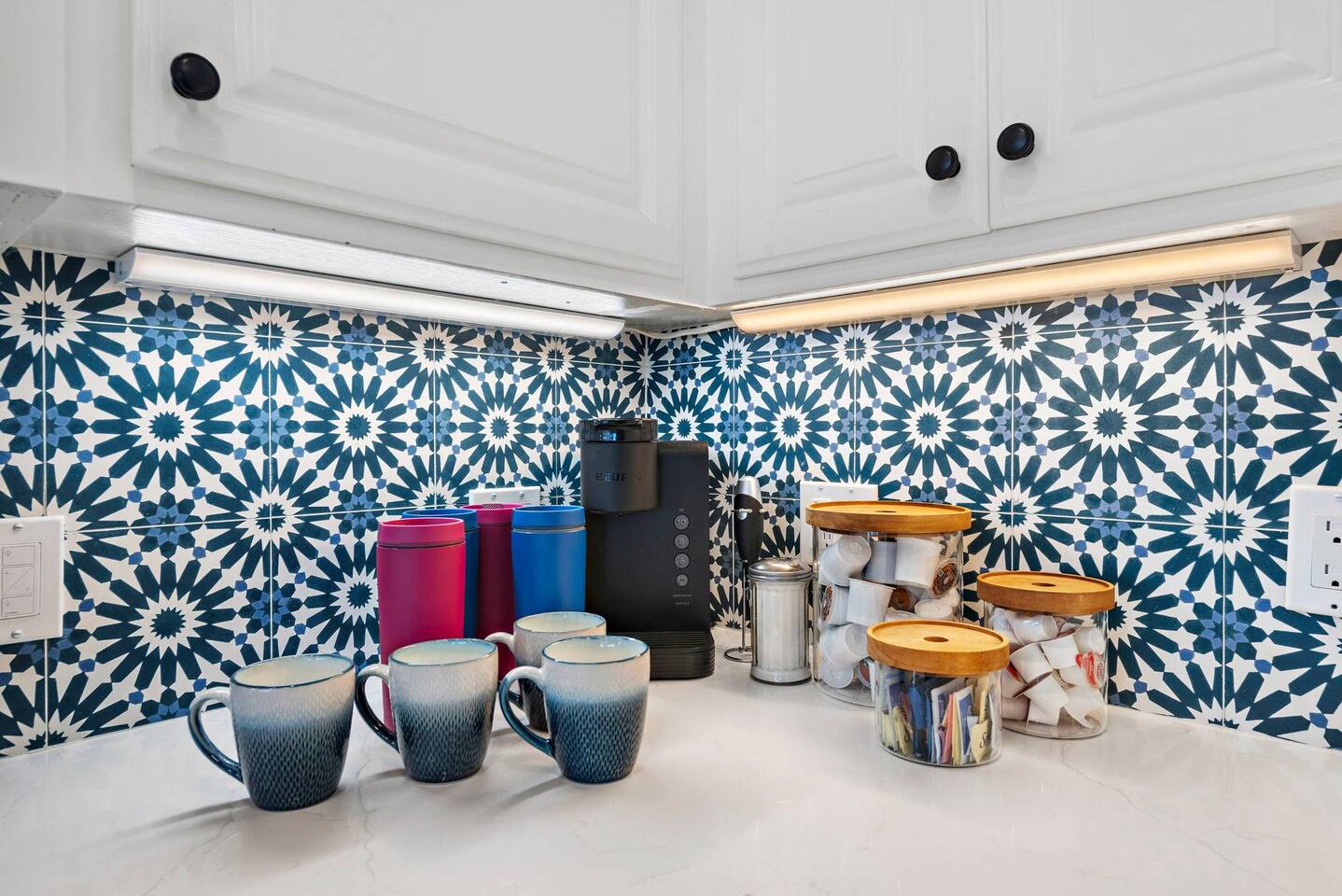 We provide Keurig coffee makers and pods to start every day right :)  This photo is from a different condo but we provide this coffee setup for all of our condos