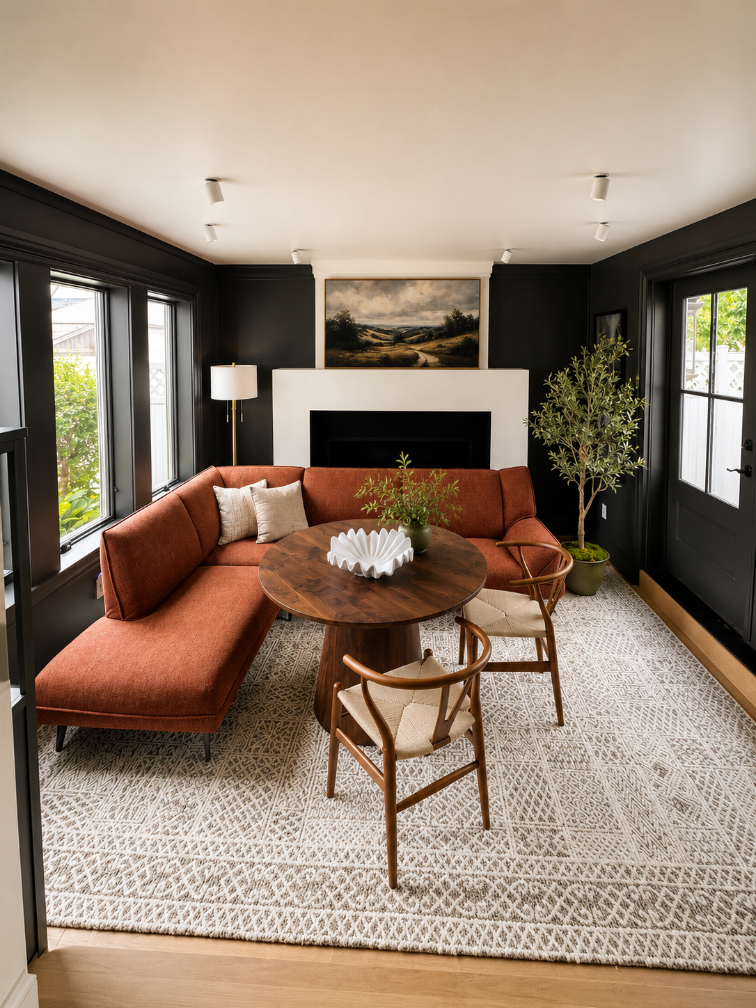 This cozy gathering space is perfect for meals, games, and conversation. Featuring comfortable banquette seating, a round table, and a warm fireplace backdrop, it's an inviting spot to enjoy morning coffee, family game night, or an evening with friends.