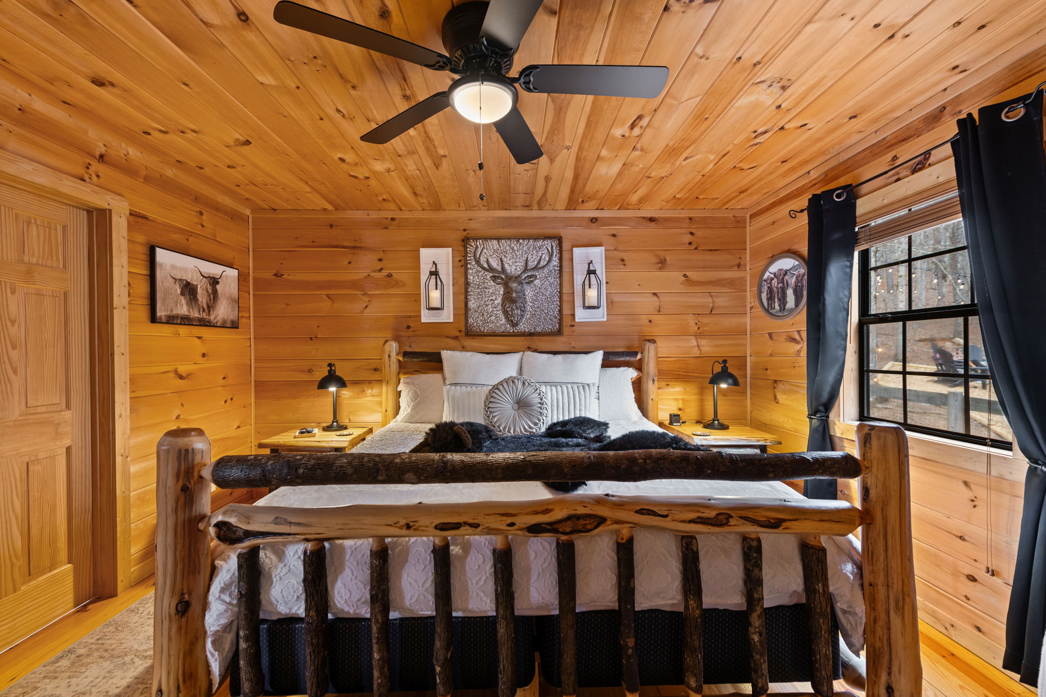 This bedroom features a spacious king-size bed, offering a comfortable and restful retreat. Thoughtfully designed for relaxation, this inviting space provides the perfect setting to unwind after a day of exploring or enjoying the property.