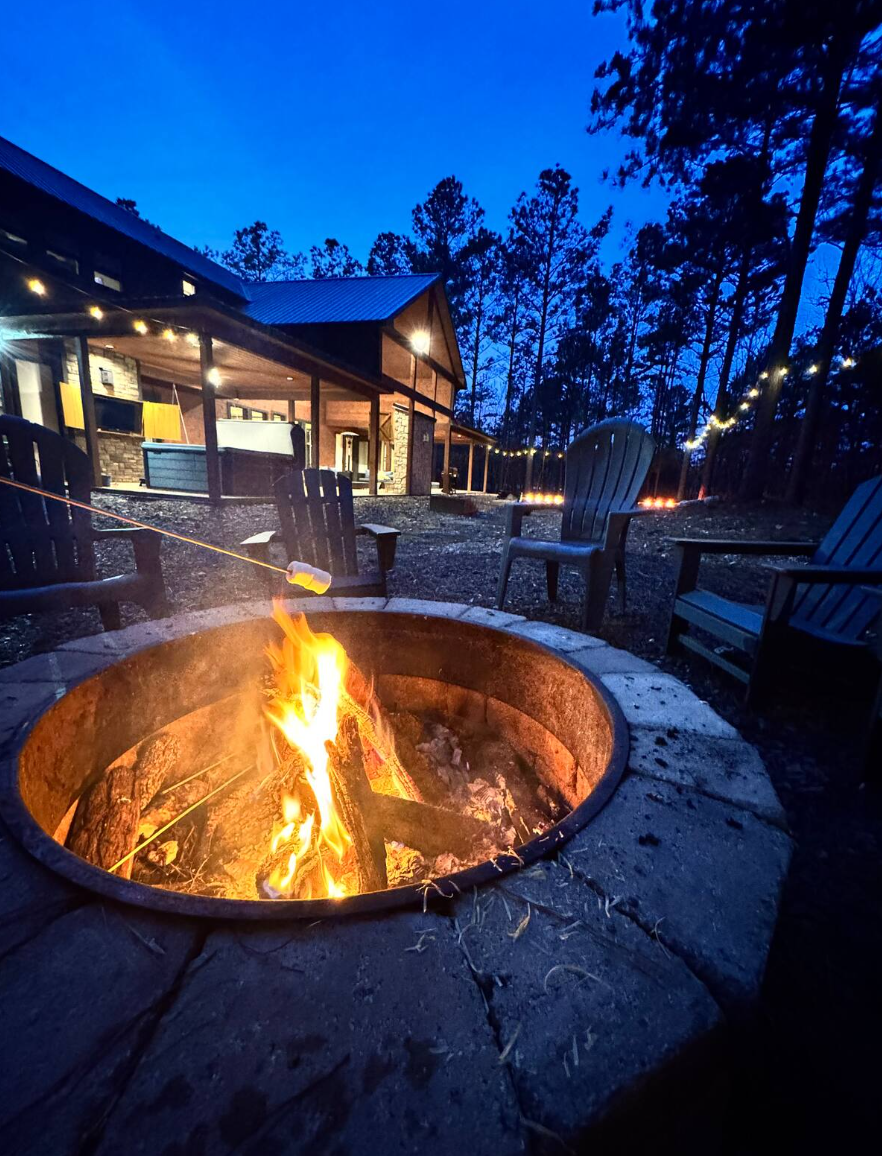 Firepit area perfect for gathering, roasting s’mores, and enjoying cozy nights under the stars with family and friends.