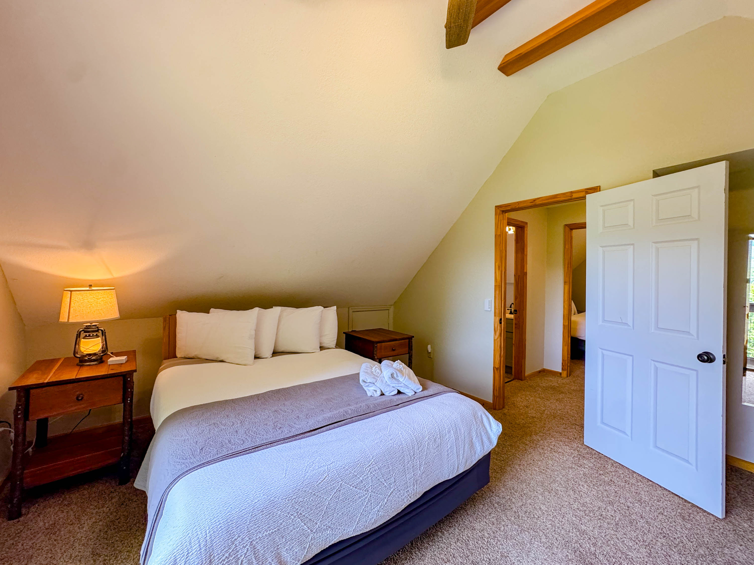 Front Bedroom with mountain views and private balcony!