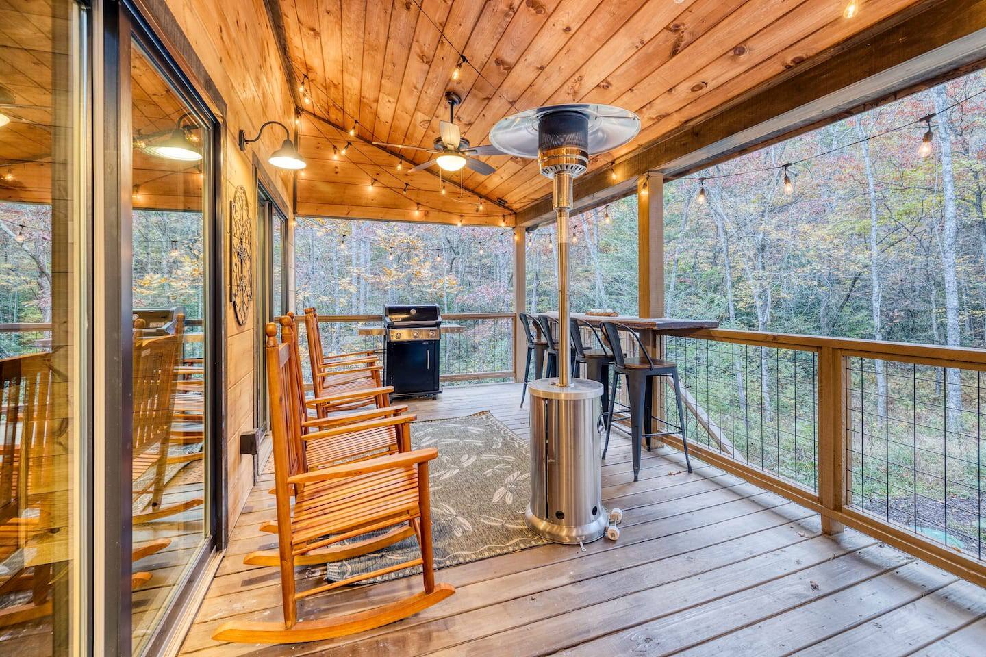 Take a seat in our cozy outdoor sitting area, where relaxation reigns supreme. And just steps away, the tantalizing aroma of the BBQ grill awaits, inviting you to savor the flavors of outdoor dining in the comfort of our rustic retreat