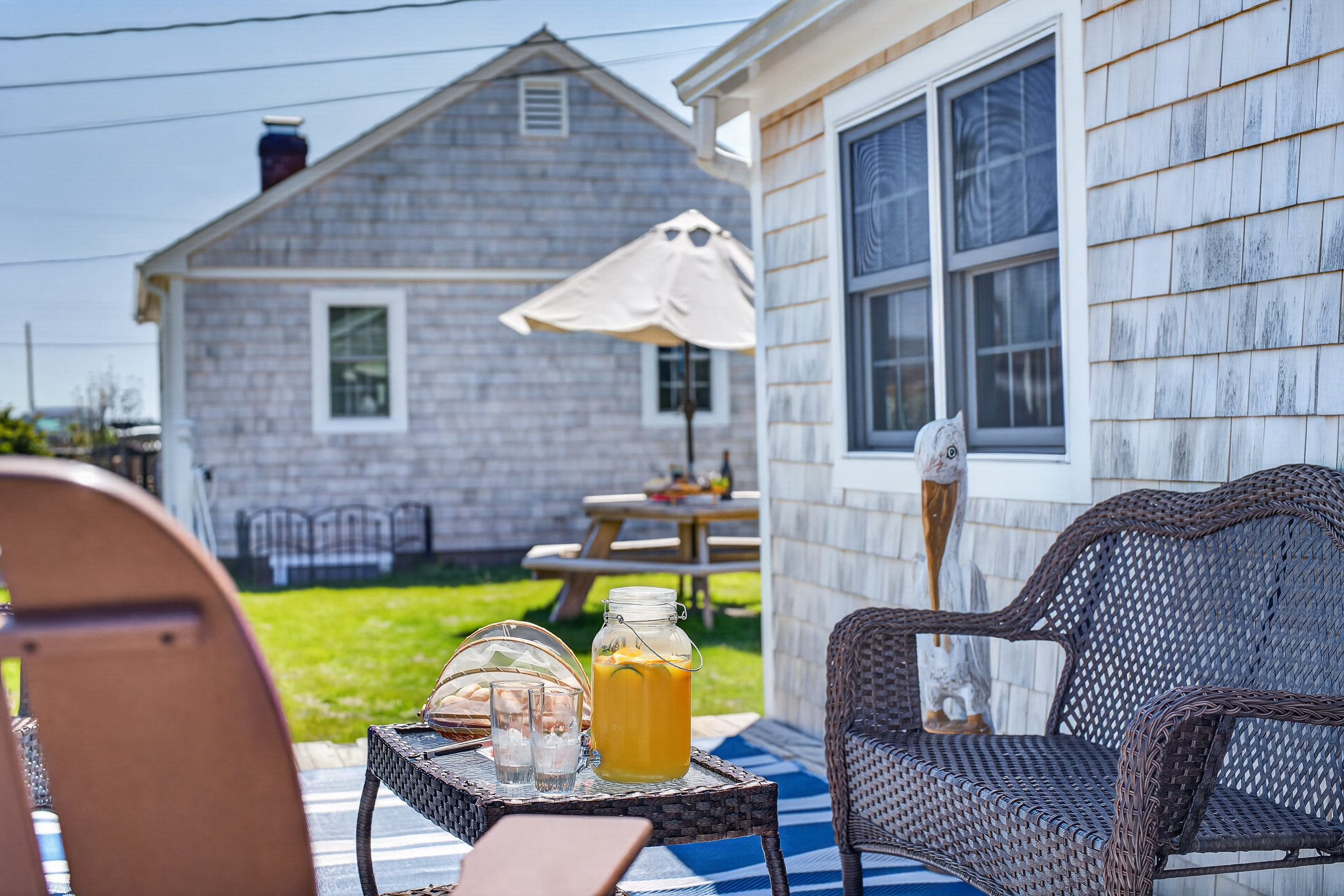 A serene exterior space that captures the essence of Cape-style coastal living.