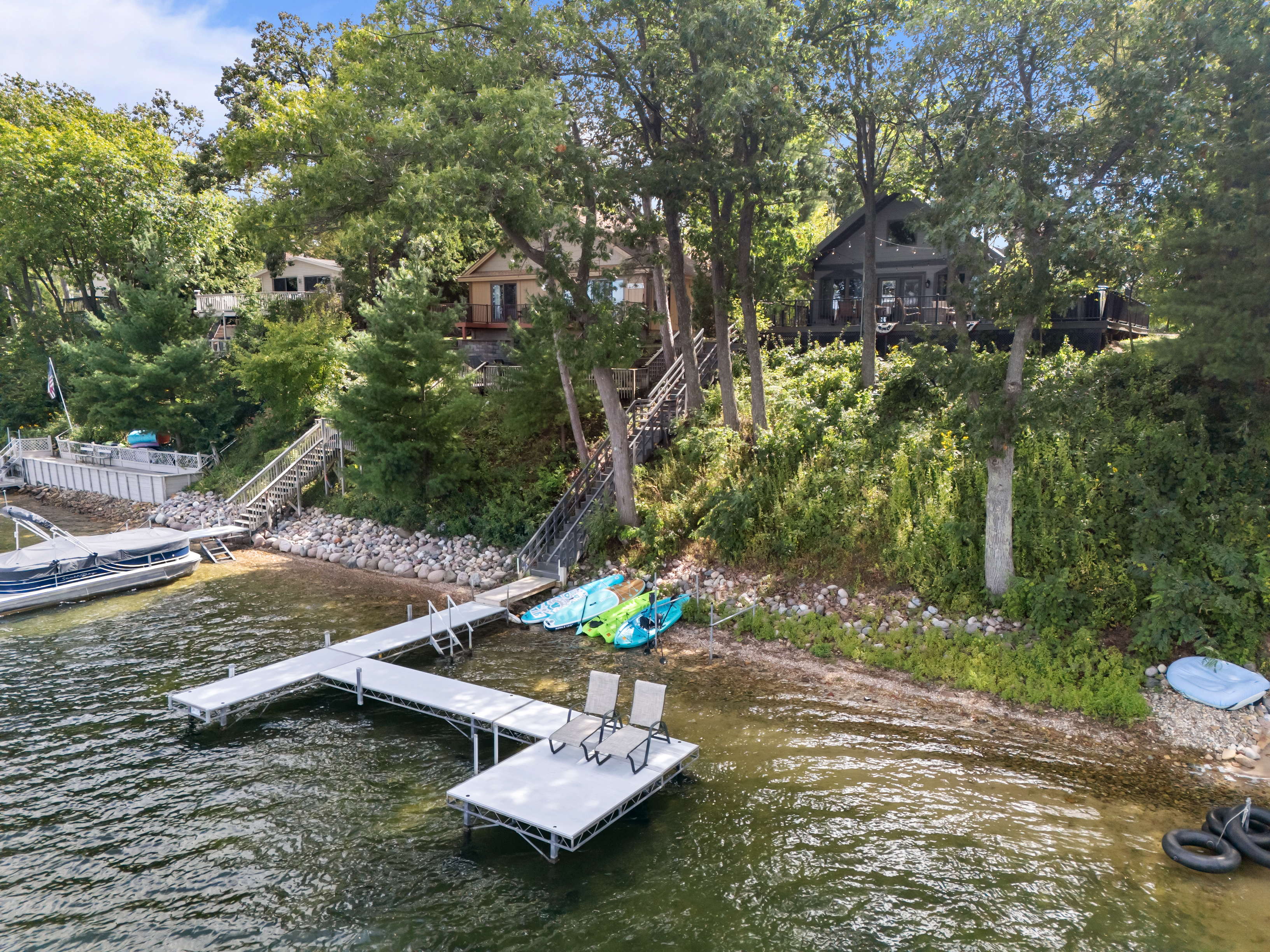Take out a kayak or paddleboard—yours to enjoy during your stay—for a perfect day exploring the lake