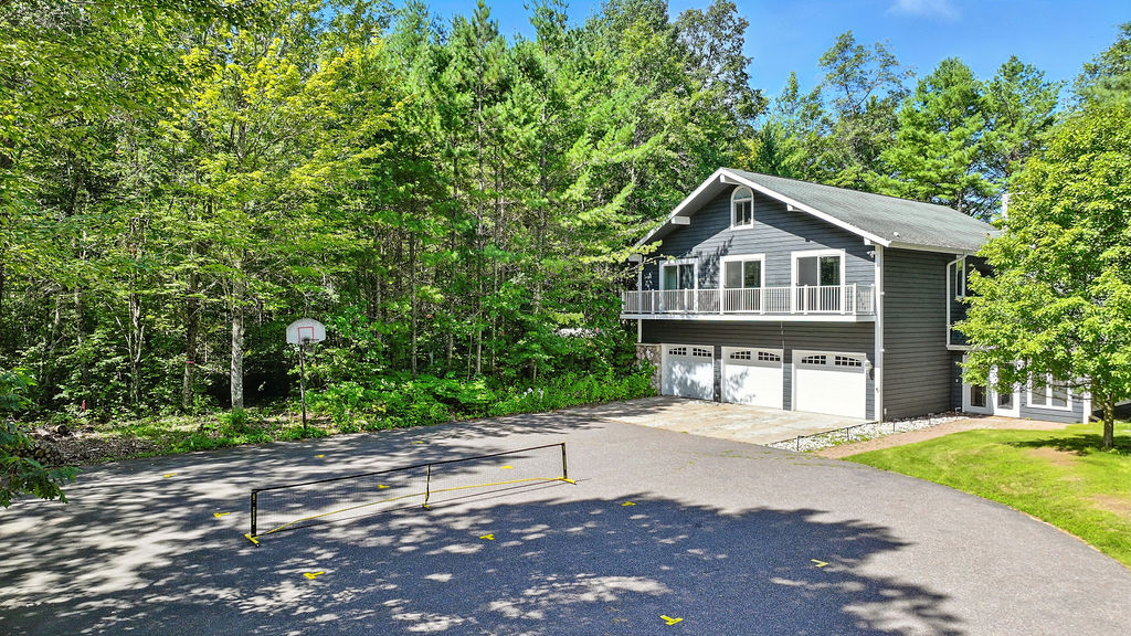 Plenty of room for parking, boat trailers, pickleball, and basketball