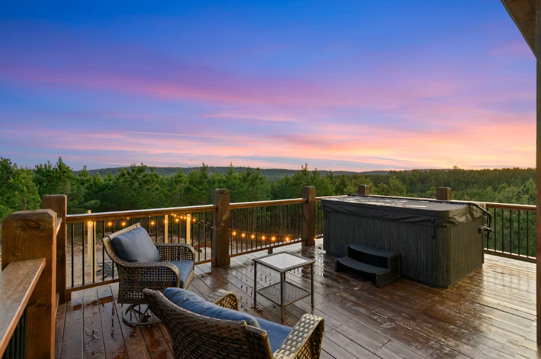 The deck is home to outdoor seating and a hot tub fitting 8 people!

