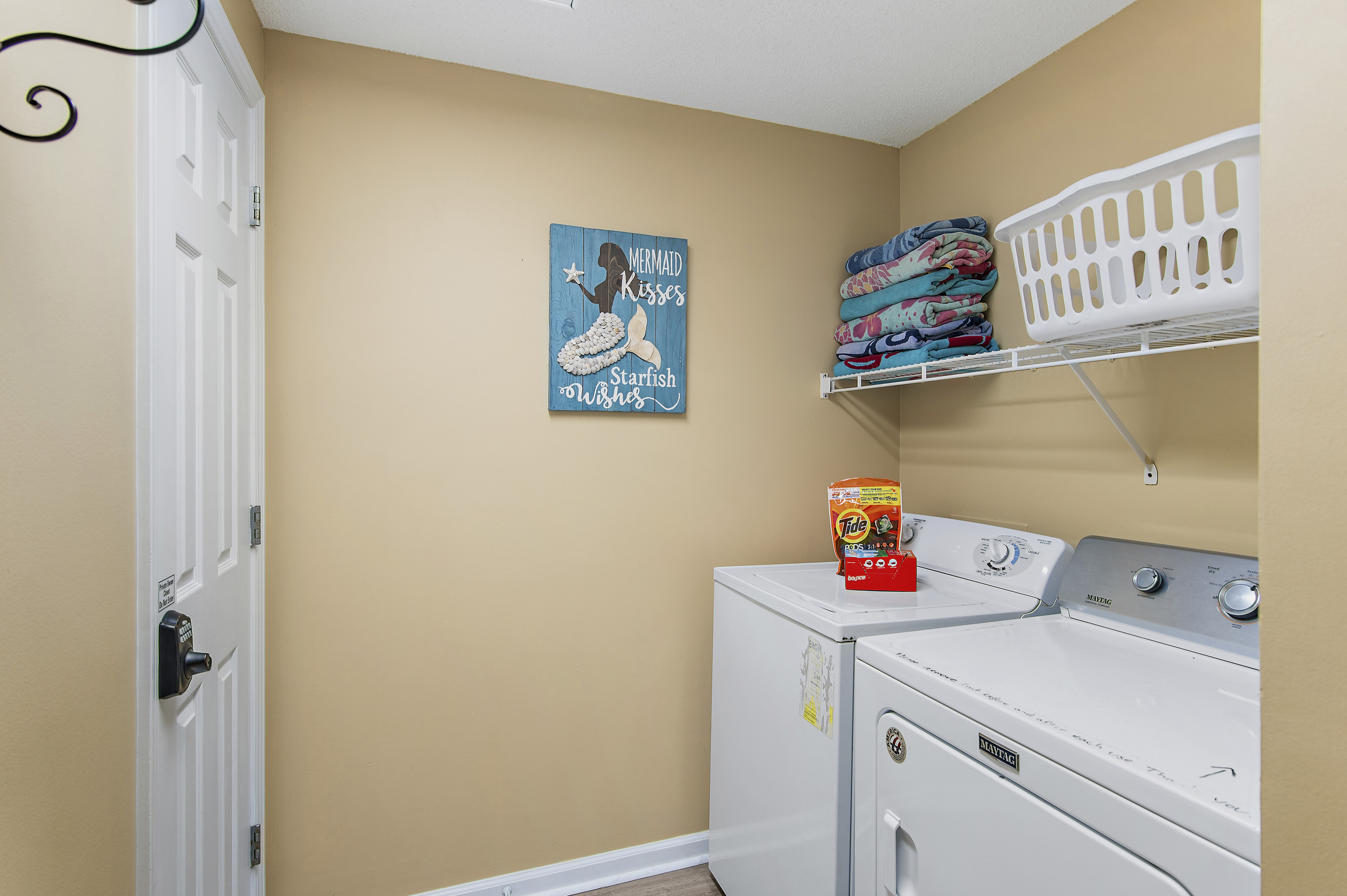 Full size washer and dryer inside the condo - we provide plenty of laundry supplies for your visit!