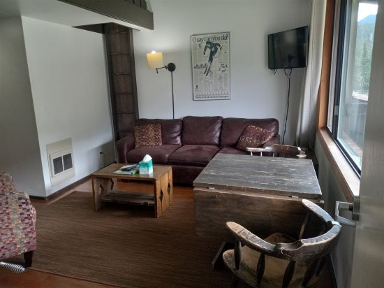 Livingroom, loft access & dinning area view from unit entrance.