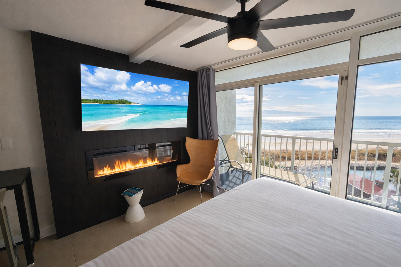 King Bed, 65" smart TV and 60" electric fireplace all with oceanfront view on your private balcony 