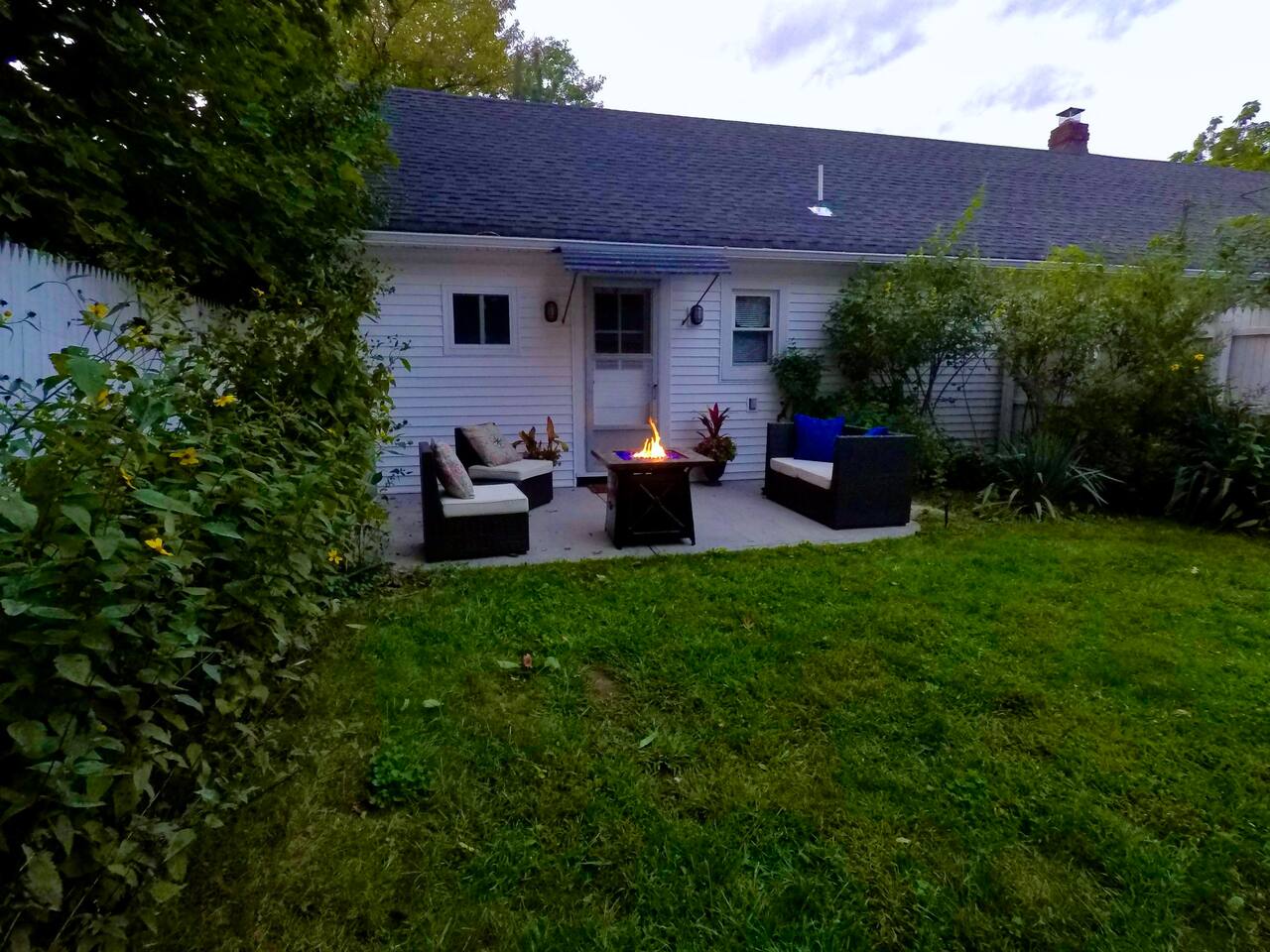 A backyard with gas fire pit for your private use and enjoyment!