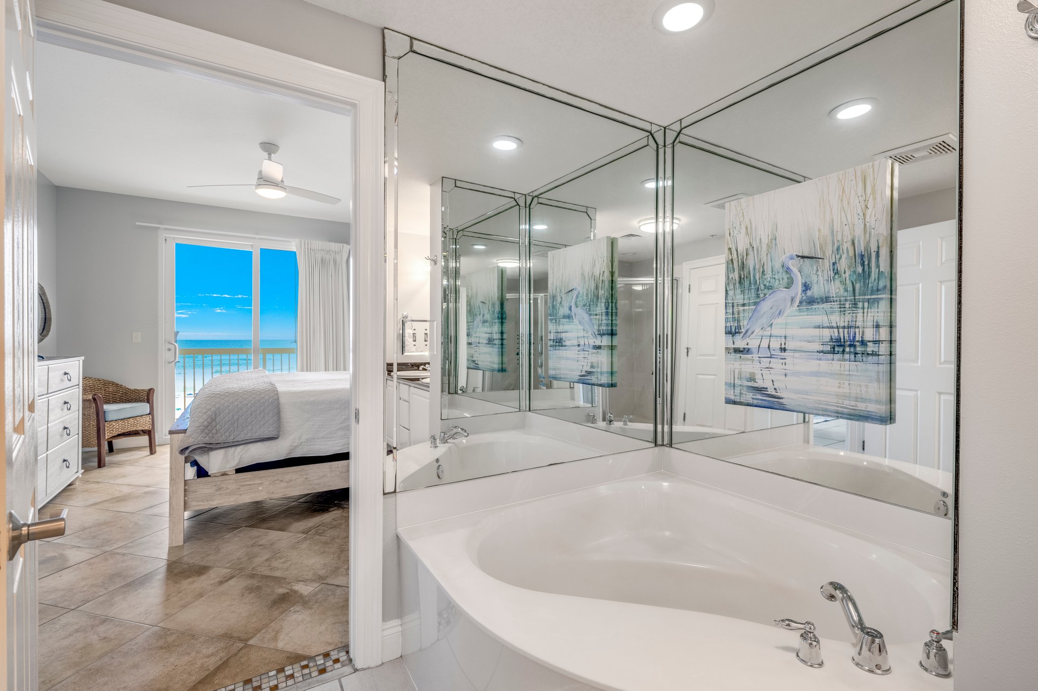 Large tub and walk-in shower with dual vanities