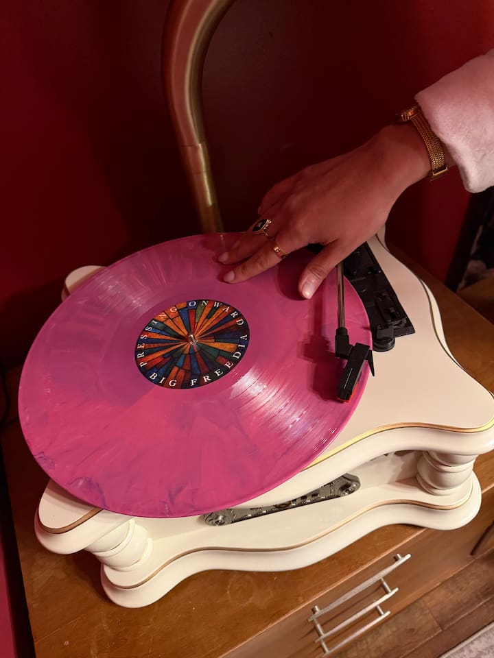 Set the mood the old-fashioned way. The primary suite's working record player is stocked with a few classics — or spin your own. Because every great NOLA night deserves a soundtrack.