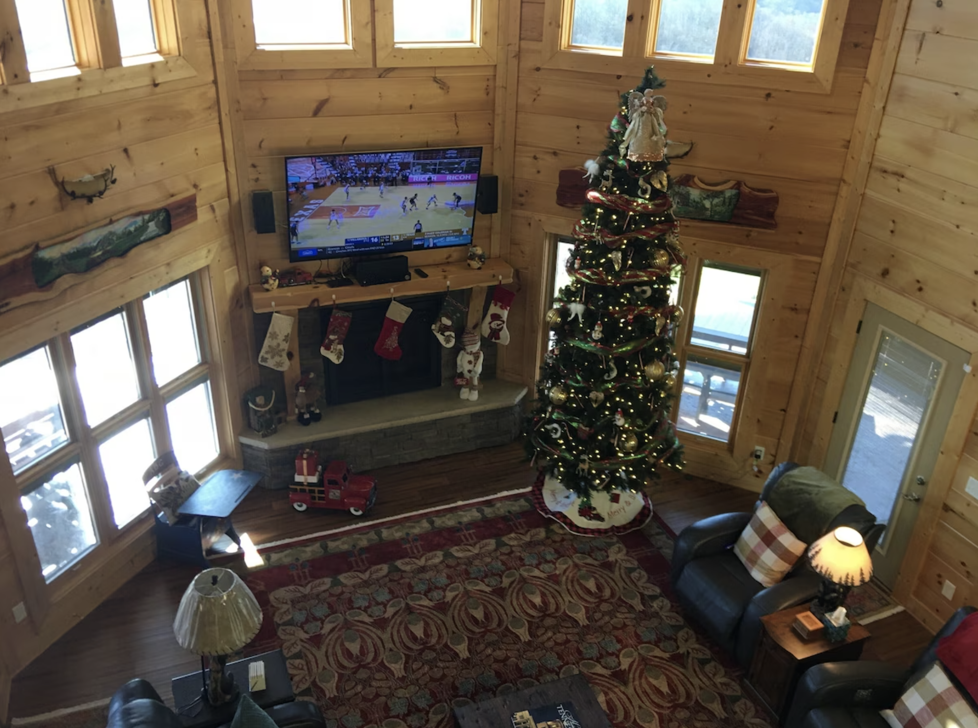 Looking down onto the living room from the overlooking loft.