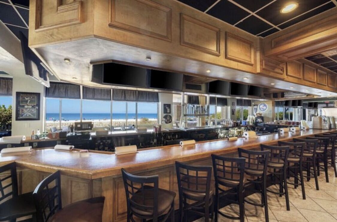 Sunset Grille Restaurant on the main floor of the building. Dine during sunsets!