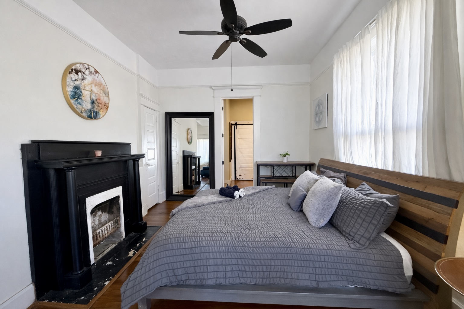 Another view of the main level master bedroom. Equipped with an ensuite bathroom and amazing natural lighting
