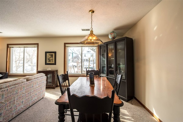 Dining room adjacent to living room and kitchen