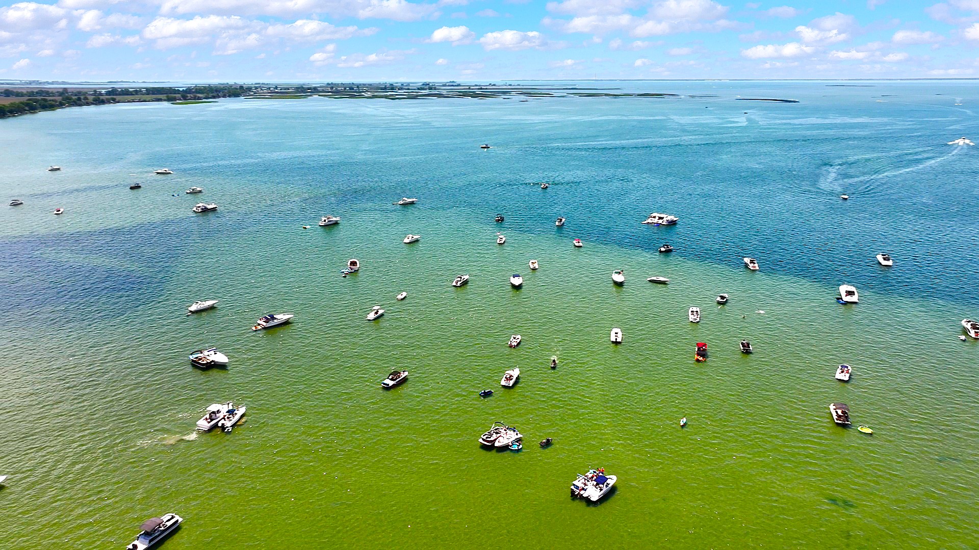 Just moments away, Lake St. Clair's popular sandy swimming area invites you to spend the day soaking up the sun, swimming in clear waters, or anchoring your boat for the ultimate lake experience.