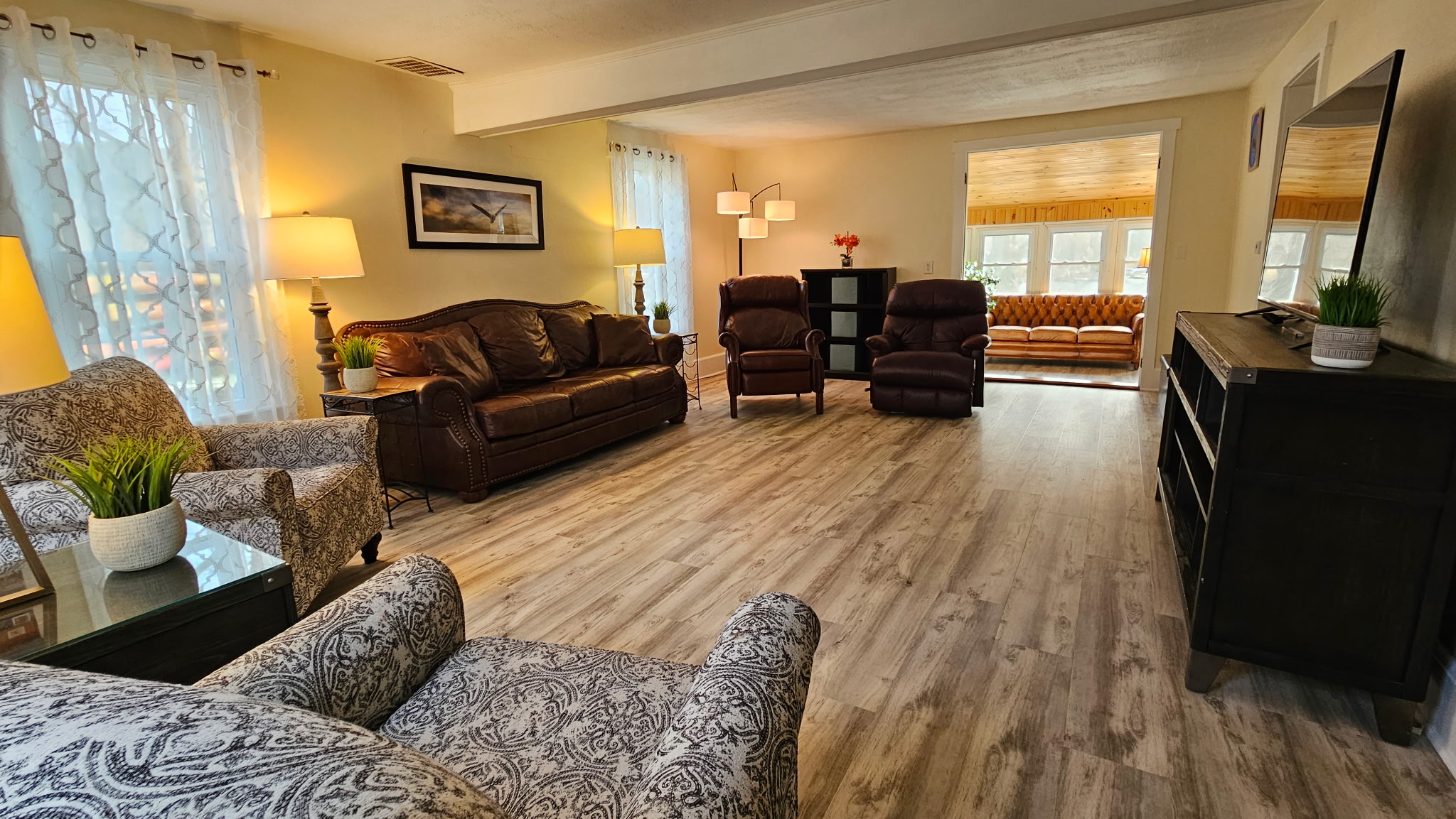 New floors throughout! Showcased here in the wonderfully large living room.