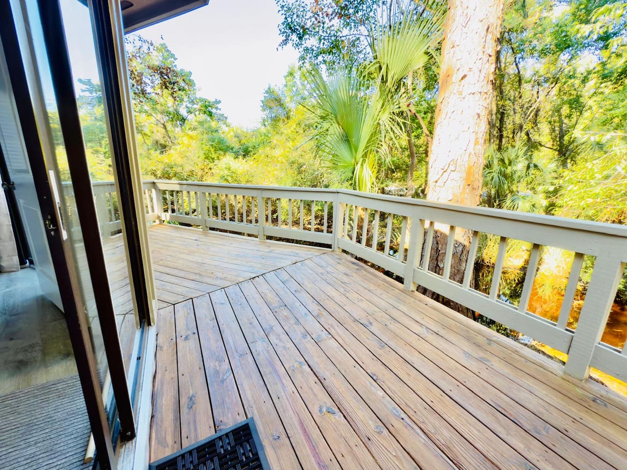 Wraparound deck among the trees