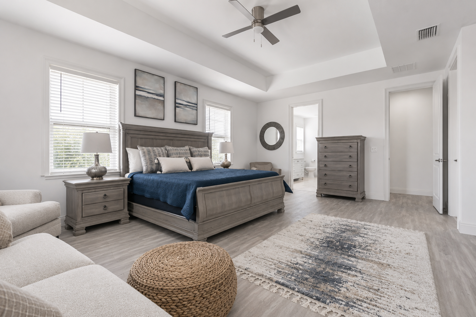 Sink into the calm of this serene primary suite, where soft coastal blues and a pillow-topped king invite slow, unhurried mornings. Wake to gentle light, linger a little longer, and remember what a real rest—and a real getaway—truly feels like.
