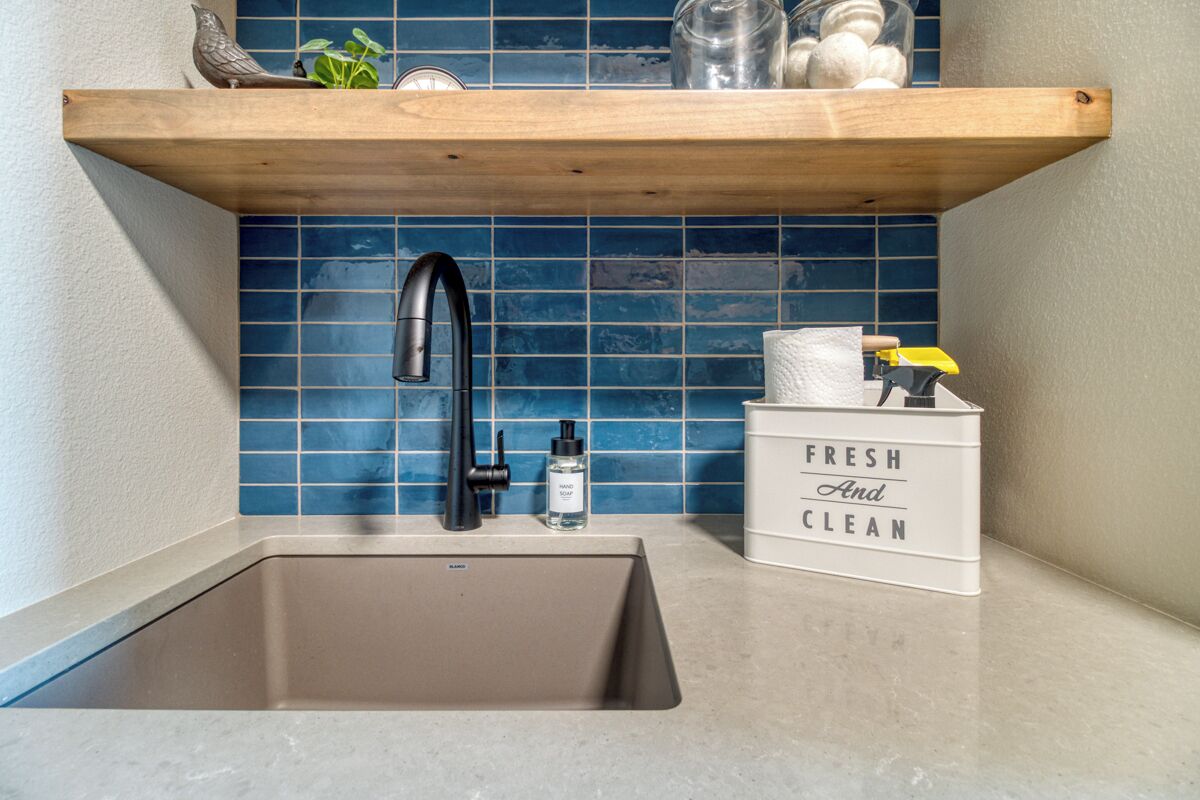 Laundry room stocked with essentials to keep your vacation stress free.