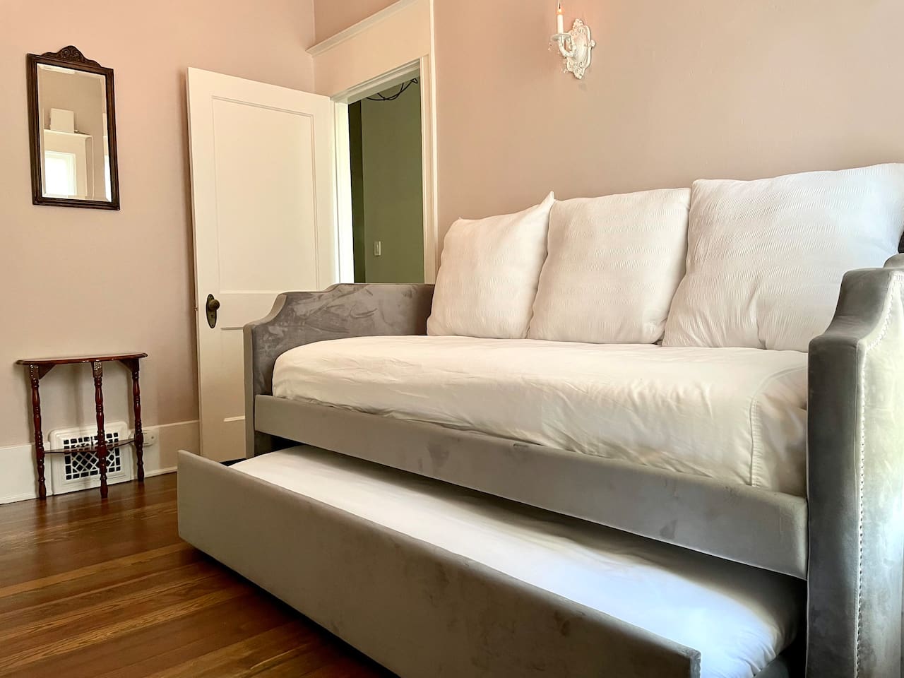 Downstairs trundle bed. Please note. This room is a small room passthrough to the kitchen and living room. This should be considered a child's room.