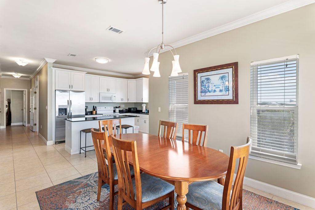 Third Floor: Dining Area – Bright dining space with seating for 6, perfect for family meals or gatherings.