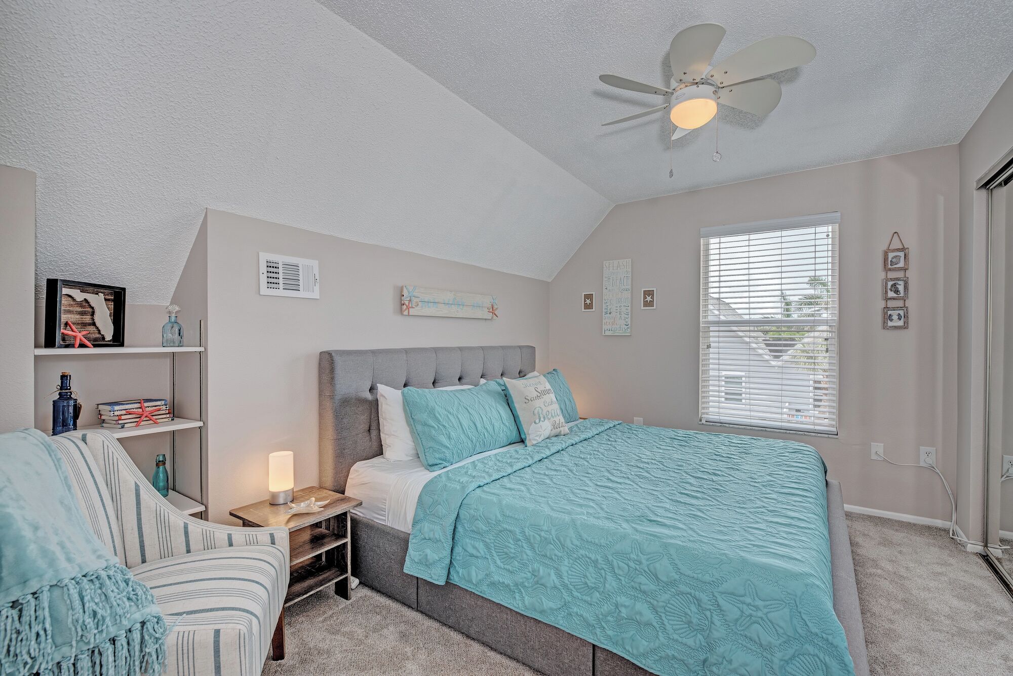 Enjoy a restful nights sleep in this upstairs coastal suite! This room also features a lux Purple mattress. 