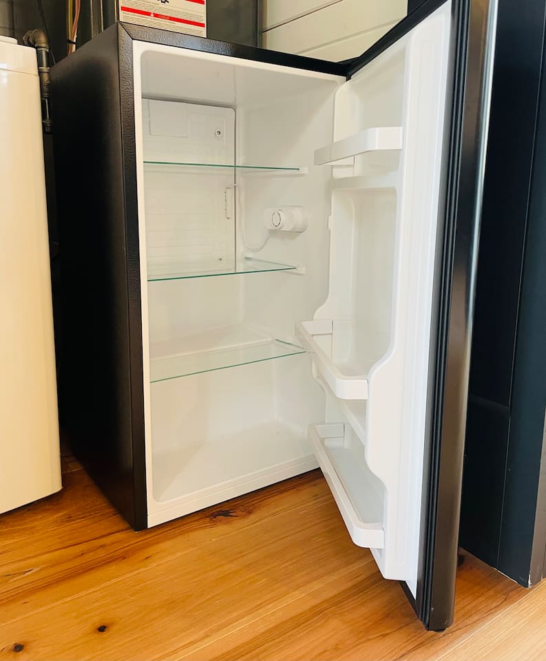 This treehouse offers a second mini fridge for your convenience